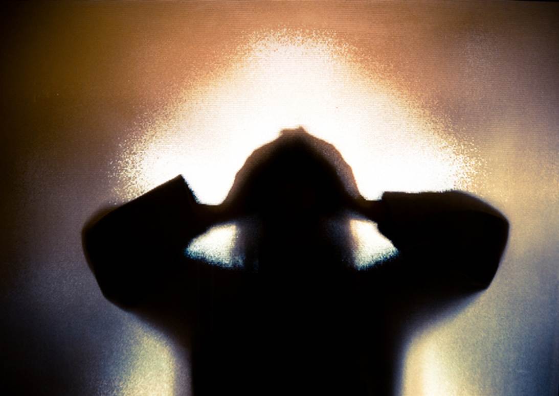 A silhouette of a person covering their ears

AI-generated content may be incorrect.